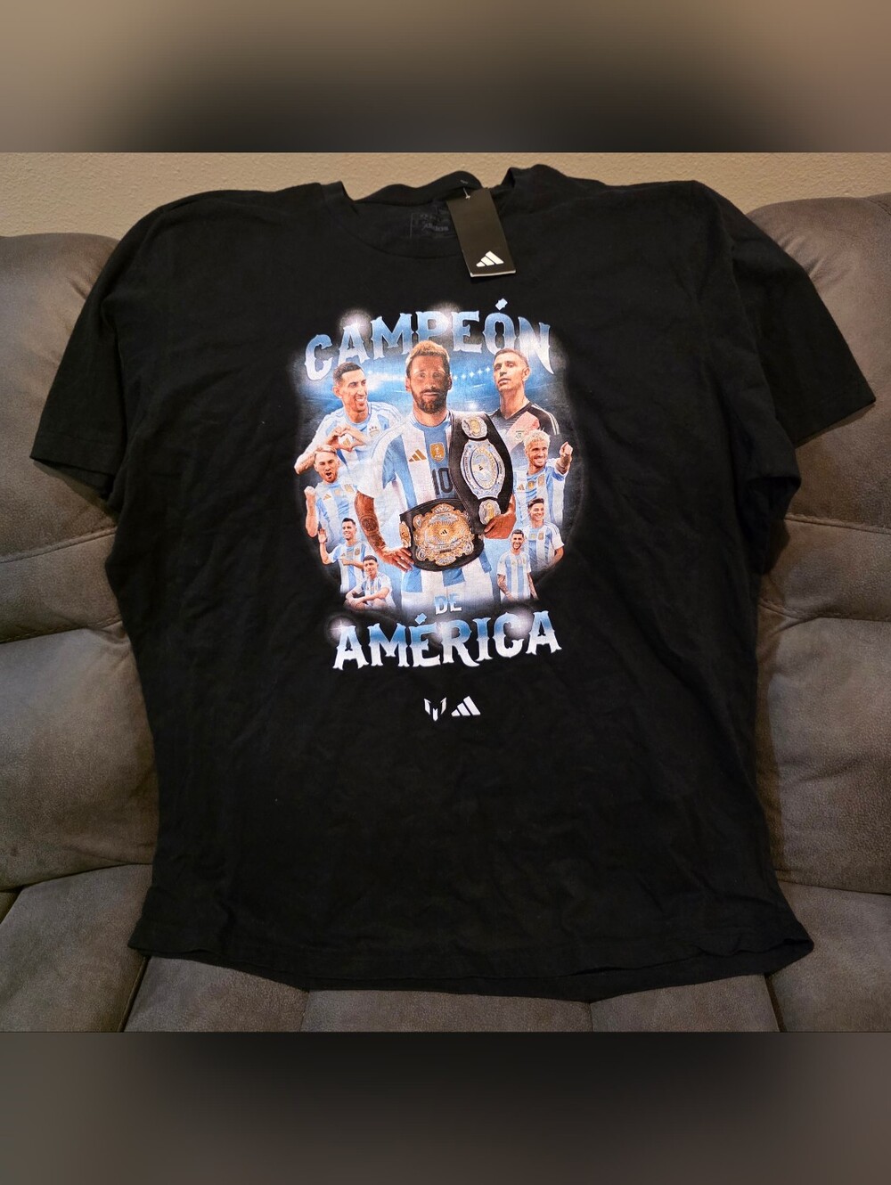 Adidas Lionel Messi Argentina “Campeon De America” soccer tee shirt in black.